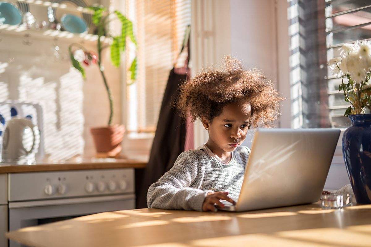 Image of young girl on her computer